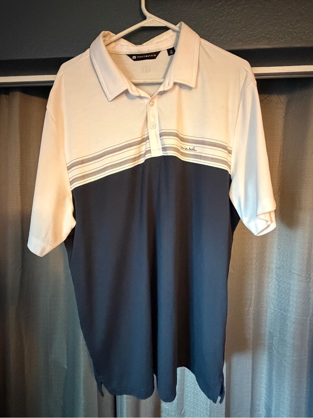 Travis Mathew Cream and Navy Stripe Performance Polo